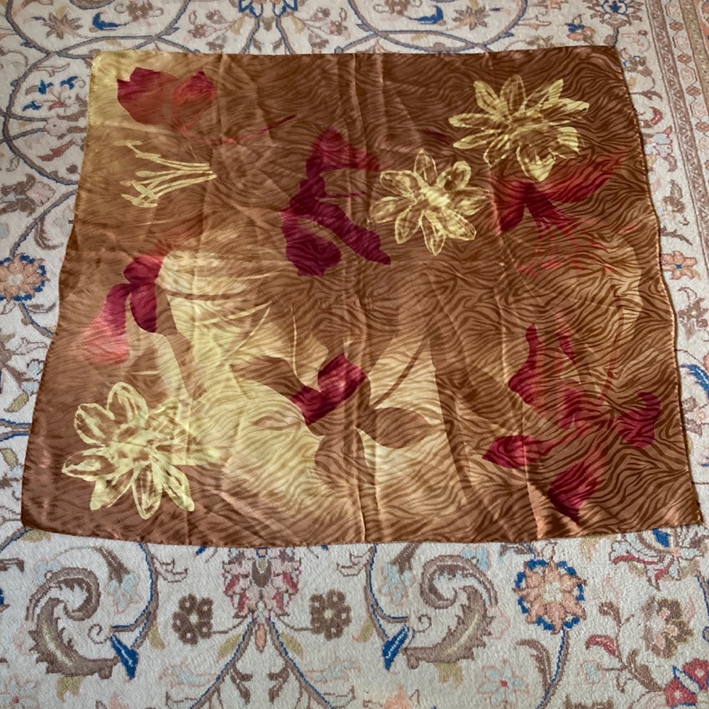Made in Italy 100% silk scarf in earthy colours. Rolled edges. 34”x34”
